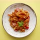 Penne Pasta with Tomato in Red Sauce on a White Plate - VideoHive Item for Sale
