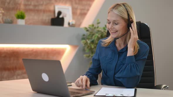 Positive Elegant Mature Caucasian Businesswoman Female Call Center Operator Financial Advisor in alt