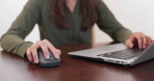 Woman work on computer at home alt