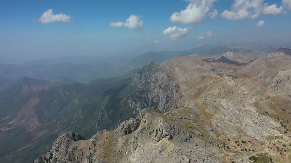 Clouds High in the Mountains Aerial View alt