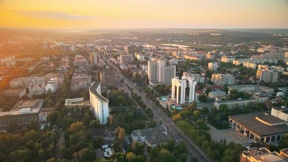 Aerial drone view of Chisinau downtown at sunset. Panorama view of multiple buildings, Parliament, P alt