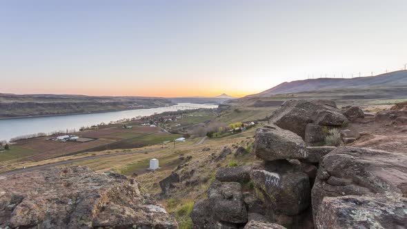 Day to night timelapse of scenic landscape in Oregon with majestic Mt. Hood in the distance  alt