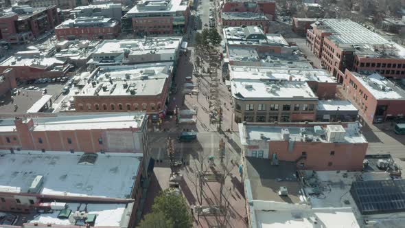 Aerial Drone Shot Tilting Up to Reveal Mountainscape Over Boulder Colorado alt