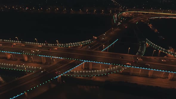 Aerial Top View of Highway Interchange at Night alt