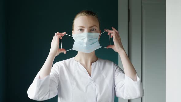 Nurse Puts On Mask 2