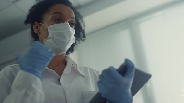 Physician Consultating Patient Using Tablet Closeup alt