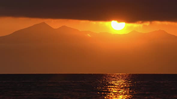 Stunning Time Lapse Seascape: Clouds Illuminated by Rays of Sun, Floating Sky