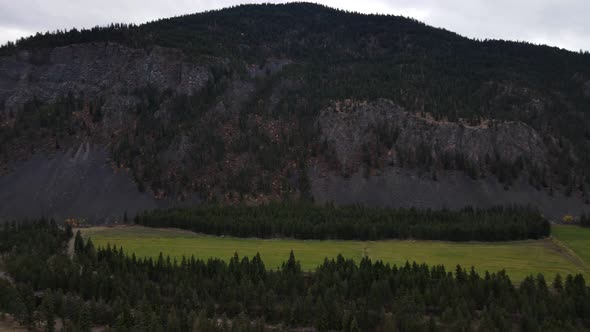 Epic mountain towering over Stemwinder Provincial Park in British Columbia, Canada. Wide angle aeria alt