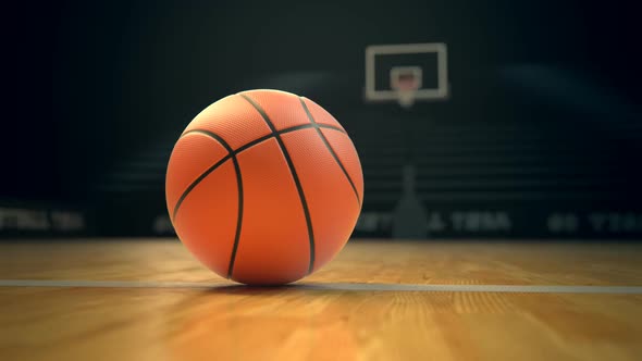 Basketball on an empty court. Close up with blurred background. Team sport. HD