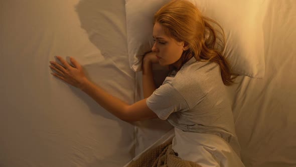Woman Crying Touching Empty Side of Bed, Loss of Beloved, Depression, Top View alt