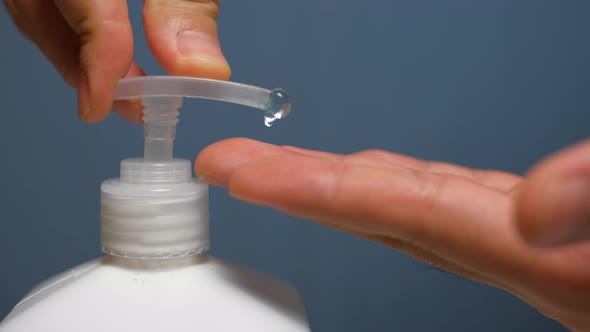 Man Disinfecting with Hand Sanitizer Dispensercorona Virus Infection Disease alt