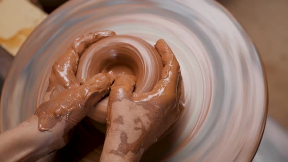 Top View Wheel Potter Hand Clay Shaping
