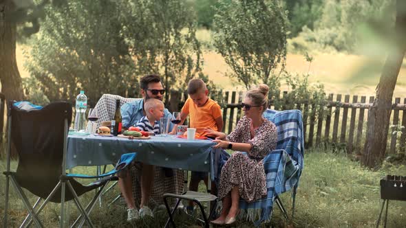 Family Mother ,Father And Child Boys Leisure. Son Boys Walking Happiness. Happy Family. alt