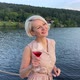 Beautiful Blonde Dancing on the Pier with a Glass of Red Wine - VideoHive Item for Sale