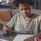 Black Boy Drawing at Home - VideoHive Item for Sale