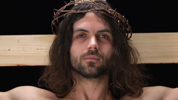 Face of Crying Jesus Christ Crucified on Cross Looking at Camera, Son of God alt