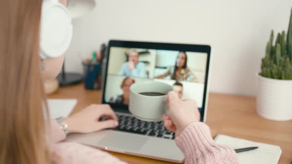 Online Group Video Call Conference of Work Team From Home Office on Laptop