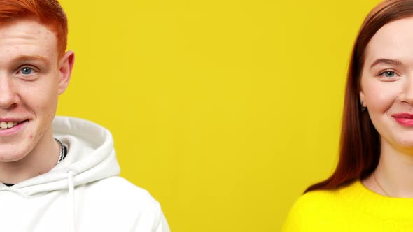 Half Faces of Smiling Redhead Young Man and Woman with Mockup Space Between alt