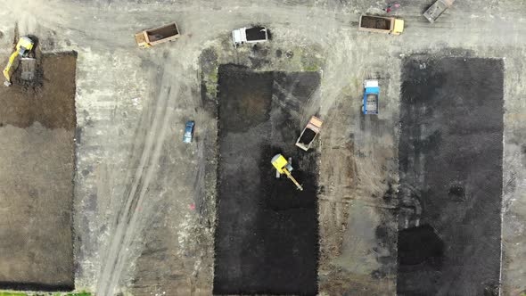 Special machinery digs a pit. alt