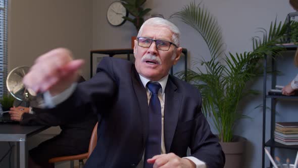Upset Business Man Loudly Yells Waving Hands From Rage at Office Workplace Screaming Angry Furious alt