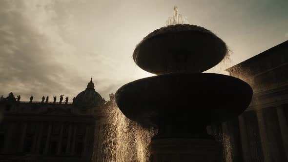 The Famous Fountain of San Pietro Italian Square with Saint Peter Church Columns, in Rome, Italy alt
