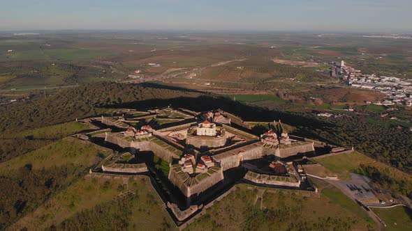 Establishing shot of the fort of Nossa Senhora da Graça catching the evening light. alt