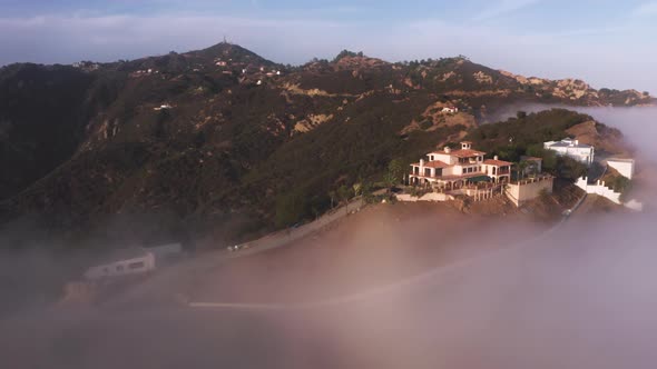 Modern Building with Epic View on Pink Clouds at Sunset Malibu California USA alt