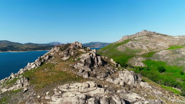 Blue Lake and Mountains in a Sunny Day alt