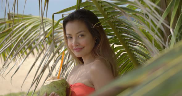 Positive Ethnic Lady Near Palm alt