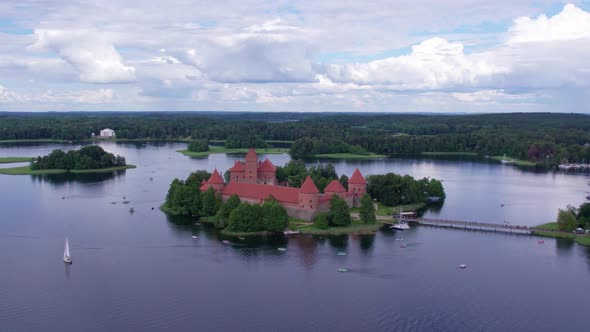 smooth aerial footage of the ancient Trakai castle on the island alt