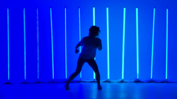 Energetic Young Woman Trains Salsa Movements alt