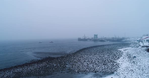 Elevated view of a harbor in winter in Maine USA alt
