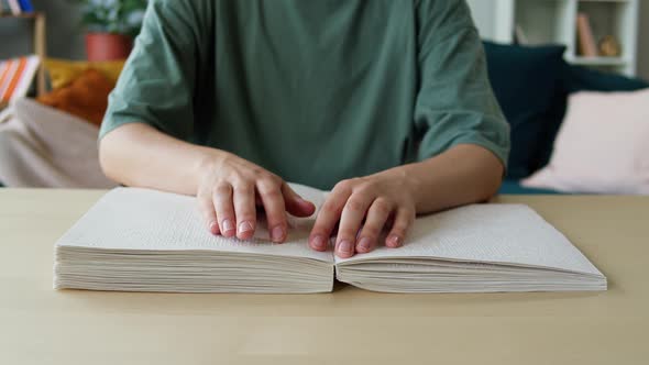 Blindman Reading Braille Book Using His Fingers Sitting in Living Room Poorly Seeing Person Learning alt
