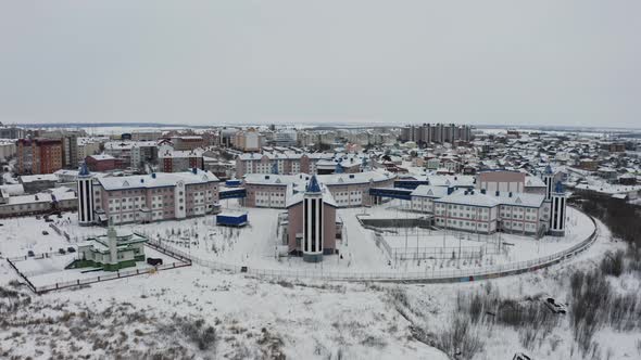 View of a Snowy Residential Area alt