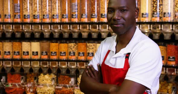 Portrait of male staff showing thumbs up alt