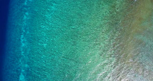 Beautiful fly over tourism shot of a sandy white paradise beach and blue sea background in colorful  alt