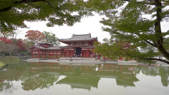 Byodoin temple (Byodo-in) with autumn leaves, Uji City, Kyoto, Japan. alt