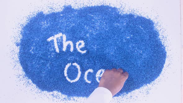 Indian Hand Writes On Blue The Ocean