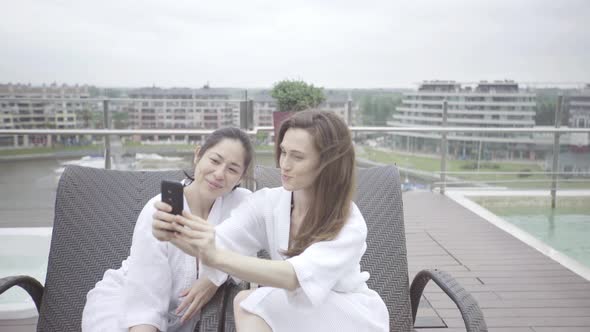 Friends posing for selfie at luxury spa