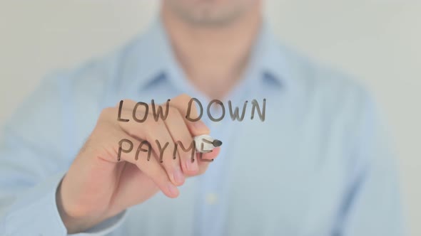 Low Down Payment, Man Writing on Transparent Glass Screen alt