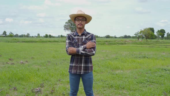 Asian farmer in field alt