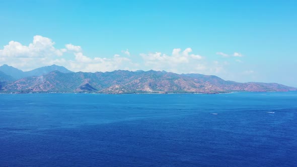 Aerial drone travel of exotic coastline beach journey by blue water and white sand background of a d alt