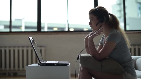 Remote work of a young woman from home during illness alt