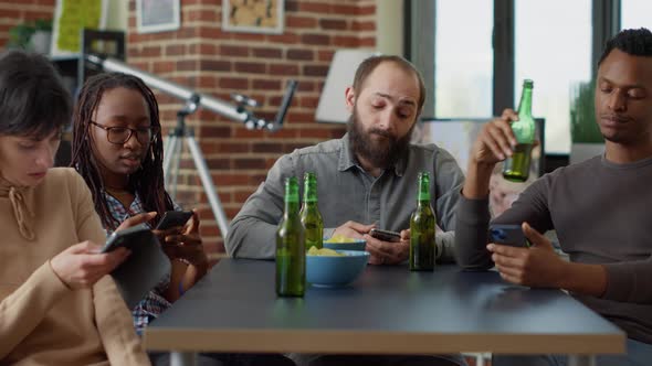 Millennial People Scrolling Through Internet on Smartphone alt