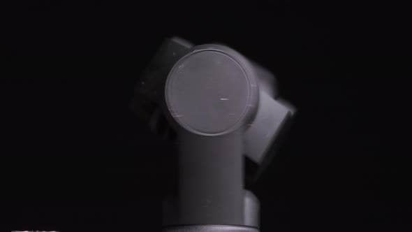 Mechanical Gimbal Camera Lens Rotates on Black Background Robotic Camera Macro alt