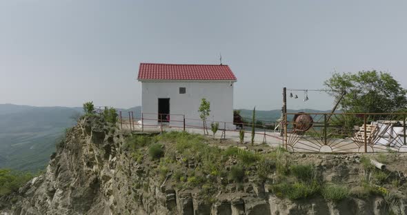 Modest sanctuary located on a hilltop above the rural Tsveri town, Georgia. alt