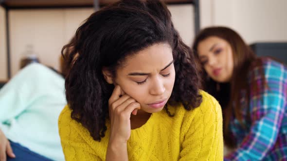 African American Woman Being Talked About Behind Her Back alt