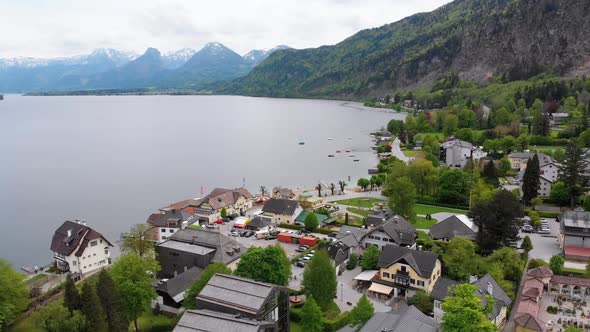 Aerial View of Mountain Lake Wolfgangsee with Houses of Resort Town in Austria, Alps alt