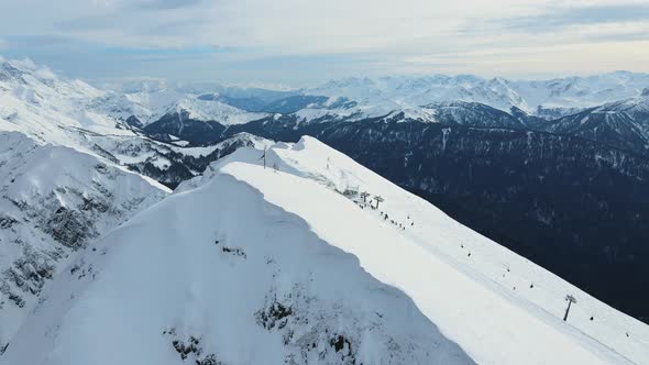 Aerial View of the Slope of the Rosa Khutor Ski Resort and Black Pyramid Peak alt