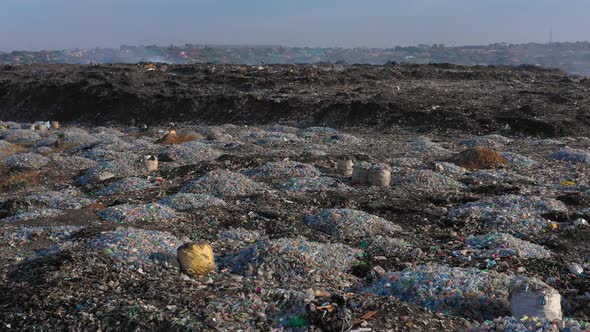 Piles of plastic garbage in a landfill. Lusaka, Zambia. 4K alt